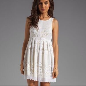 Free People white lace cut out back short dress